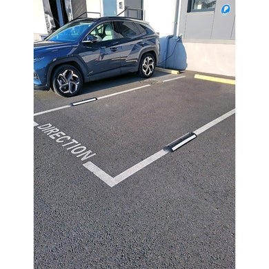 Séparateur de voie franchissable en caoutchouc vulcanisé