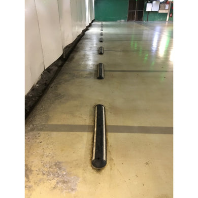 Séparateur de voie franchissable en caoutchouc vulcanisé